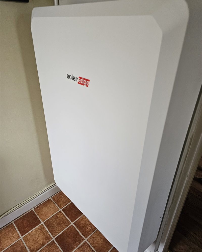SolarEdge battery storage unit installed on a wall